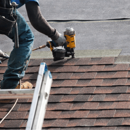 roofers hq professional roofing contractors installing roof shingles man on roof